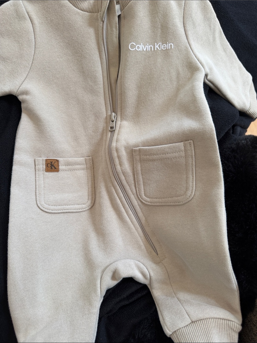 Calvin Klein Kids Neutral Beige One-Piece with Front Zip